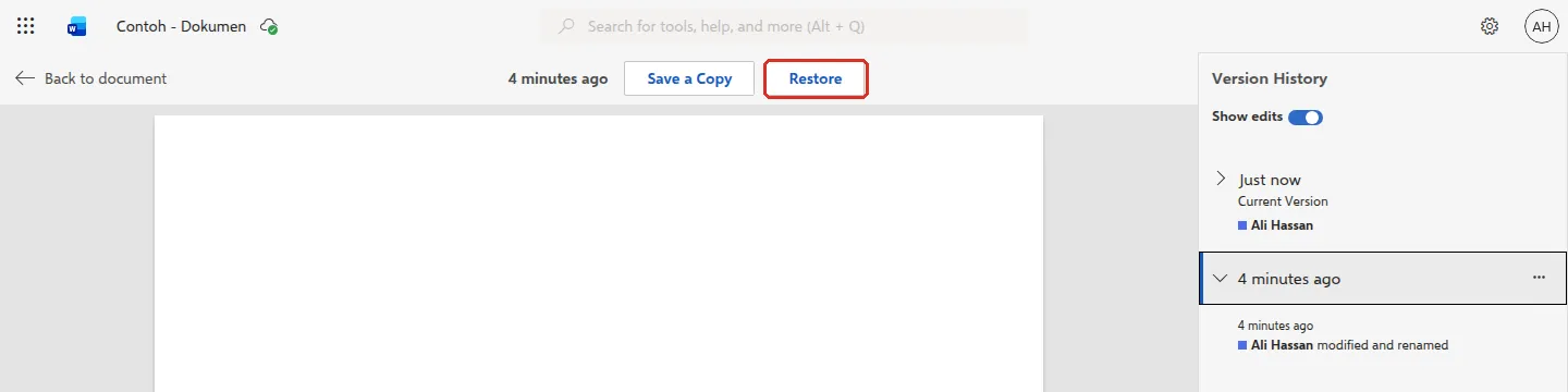 Version History with an older version selected and the Restore button highlighted