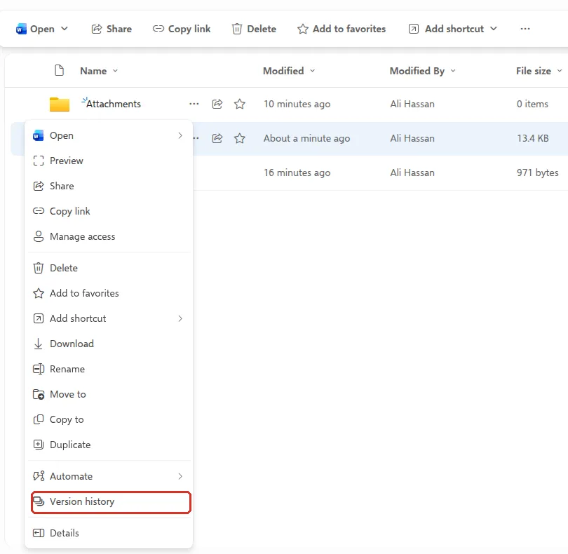 OneDrive right-click menu with Version history highlighted