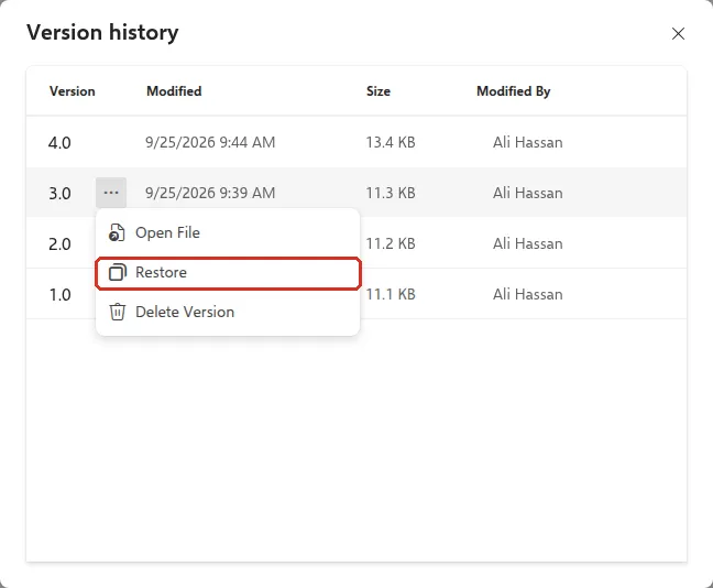 Version history list with the more options menu open and Restore highlighted